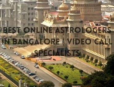 Aerial view of Vidhana Soudha in Bengaluru, domes gleaming, gardens and parked cars lining avenue.