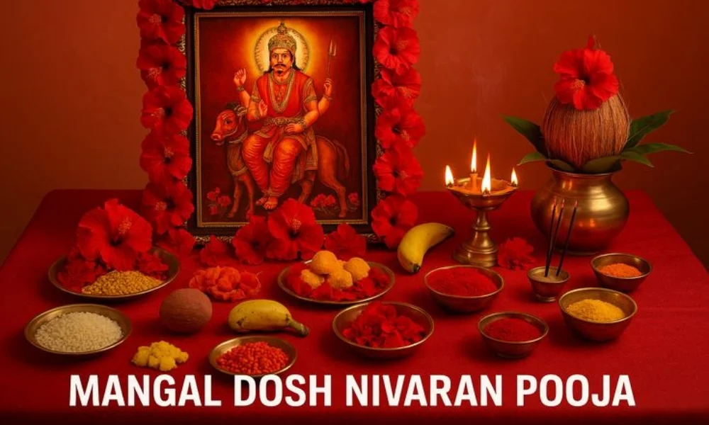 Ritual setup for Mangal Dosh Nivaran Pooja with deity image, lamps, flowers, powders, offerings.