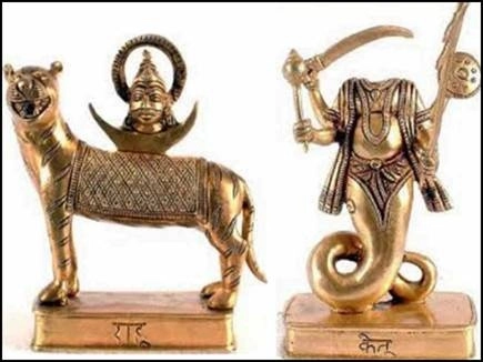 Intricate metal sculptures showing Rahu’s ambition and Ketu’s detachment in Vedic iconography.