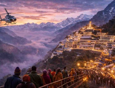 Pilgrims walking towards Vaishno Devi Bhawan at dusk with helicopter flying over Trikuta mountains during Vaishno Devi Yatra 2026